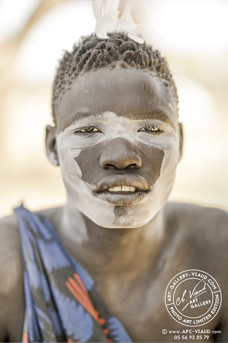 Dans tes yeux maquillés